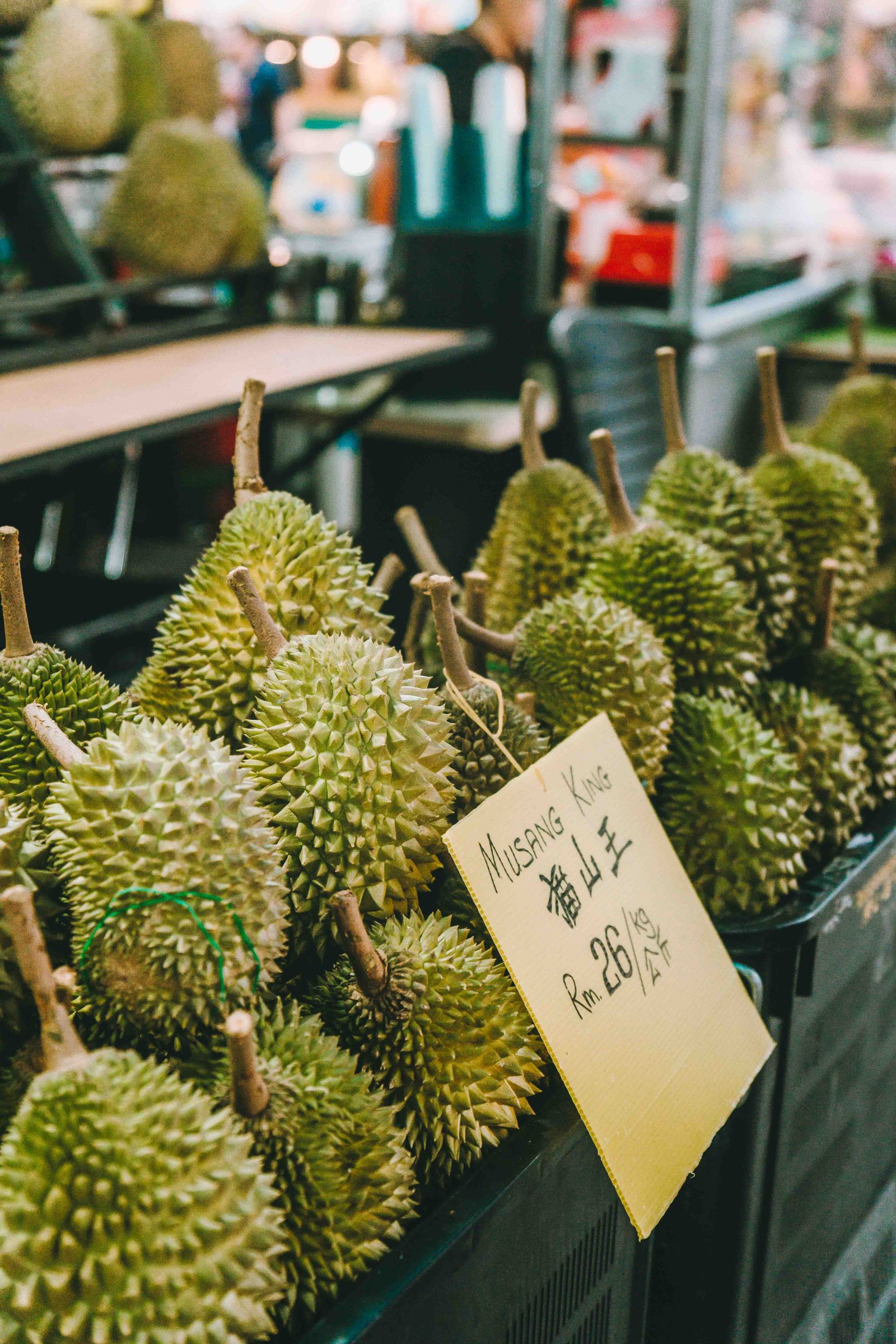 Musang King durians displayed at a Malaysian market